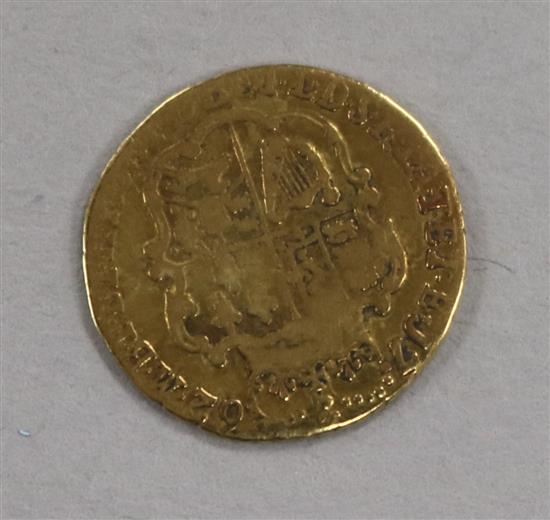 A George III gold quarter guinea, 1762, 2g, F